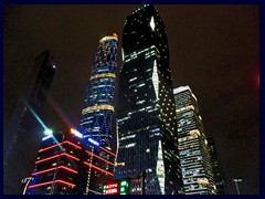 Zhujiang New Town at night, from the left: Chow Tai Fook Center (530m, completion 2016, not illuminated), IFC (International Finance Center (438m, built 2010), R&F Yangkai Square (296m, built 2014).See more in the night section.